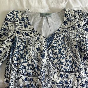 White and blue v-neck a line top